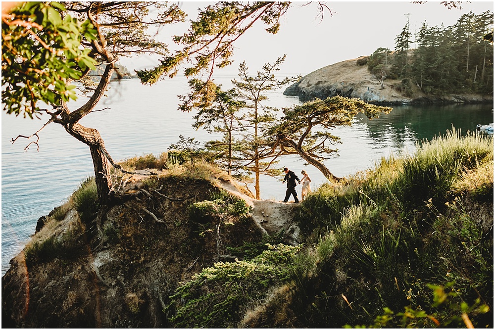 Bride and groom explore nature
